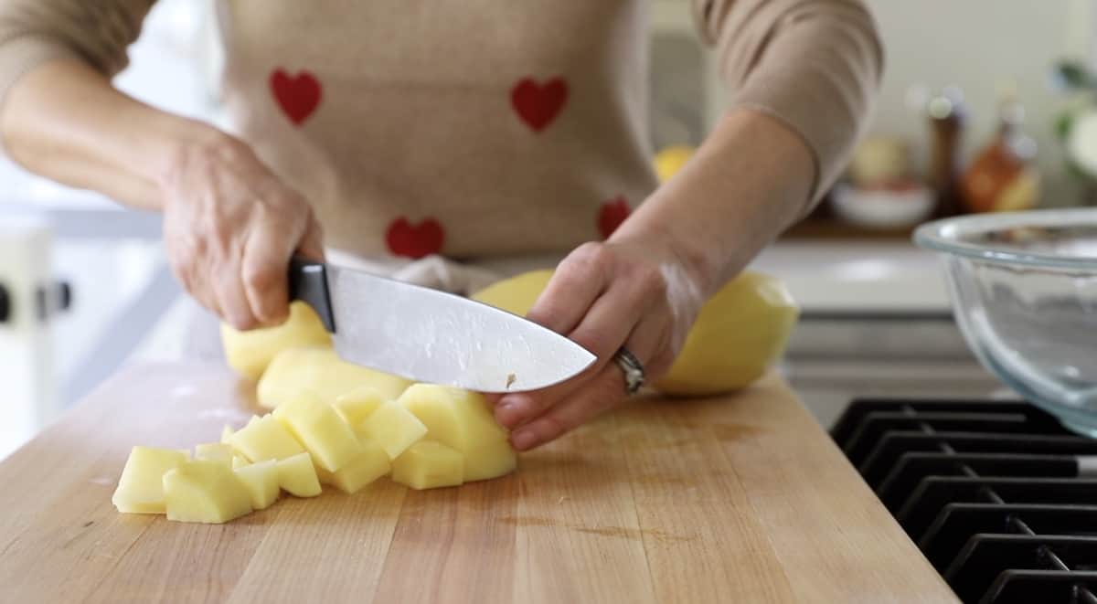 Slicing YouKon Gold Potatoes into cubes