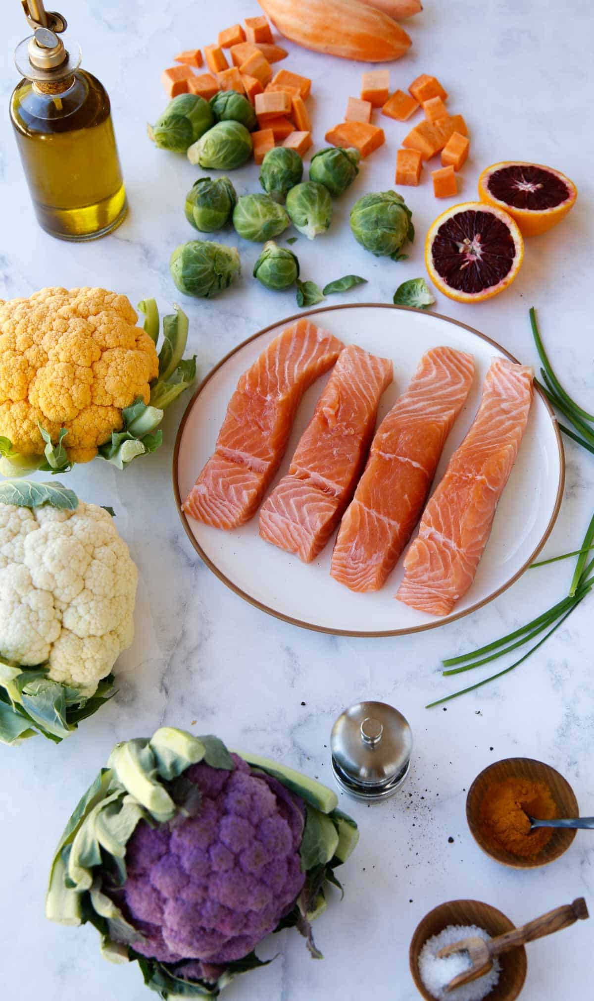 Ingredients for Pan Seared Salmon and Vegetables on a plate