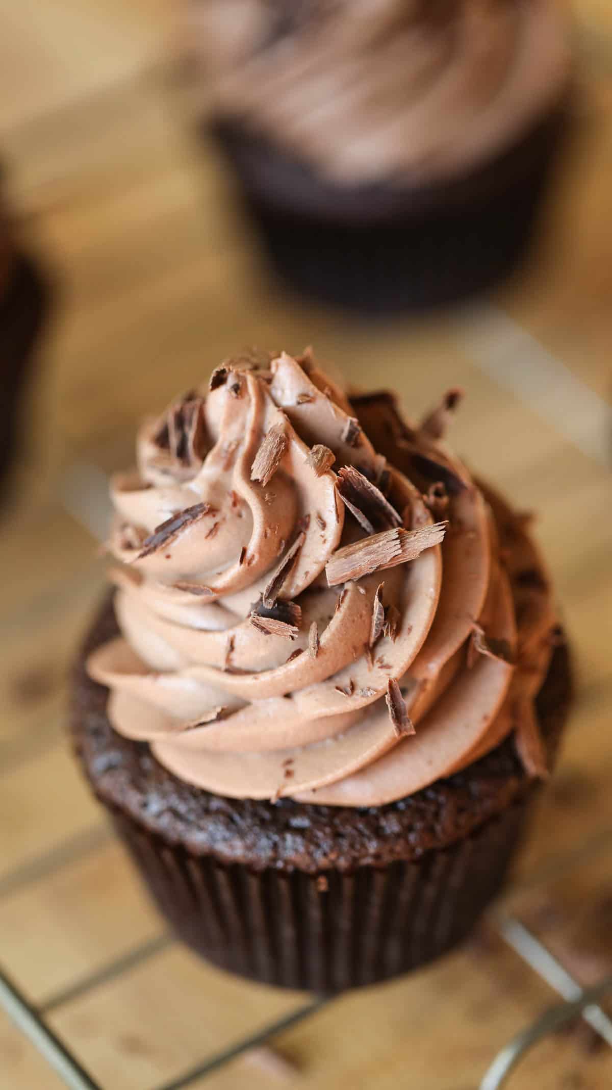 Close of a chocolate cupcake with chocolate frosting