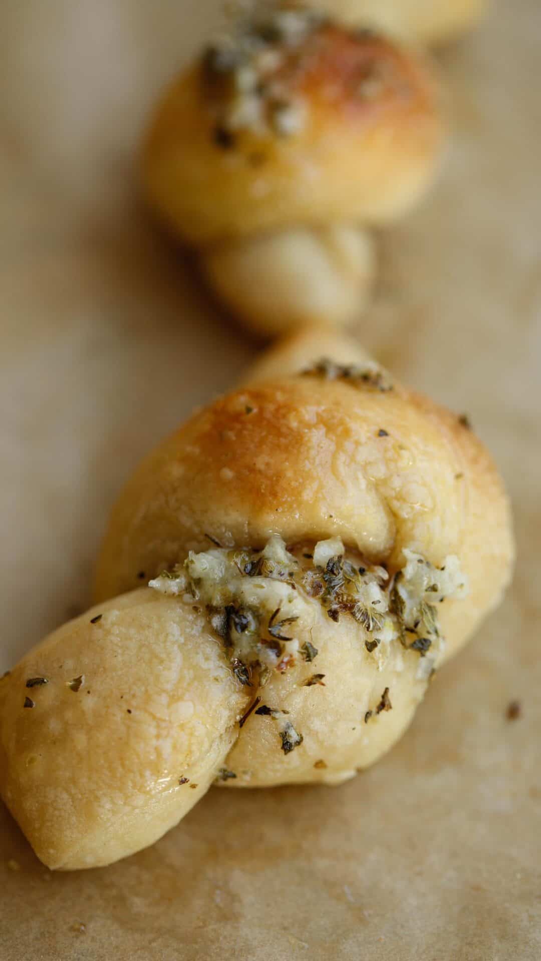 a baked garlic knots with garlic and spices