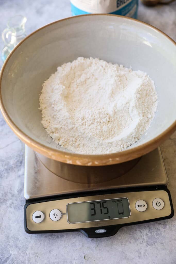 a bowl with flour on a kitchen scale