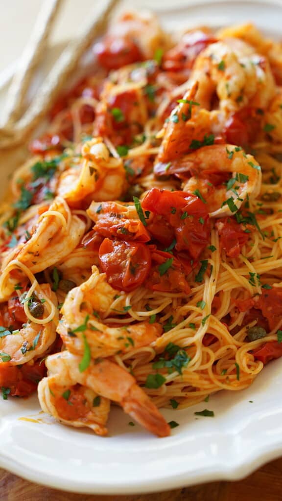 close up of pasta tossed with shrimp scampi sauce