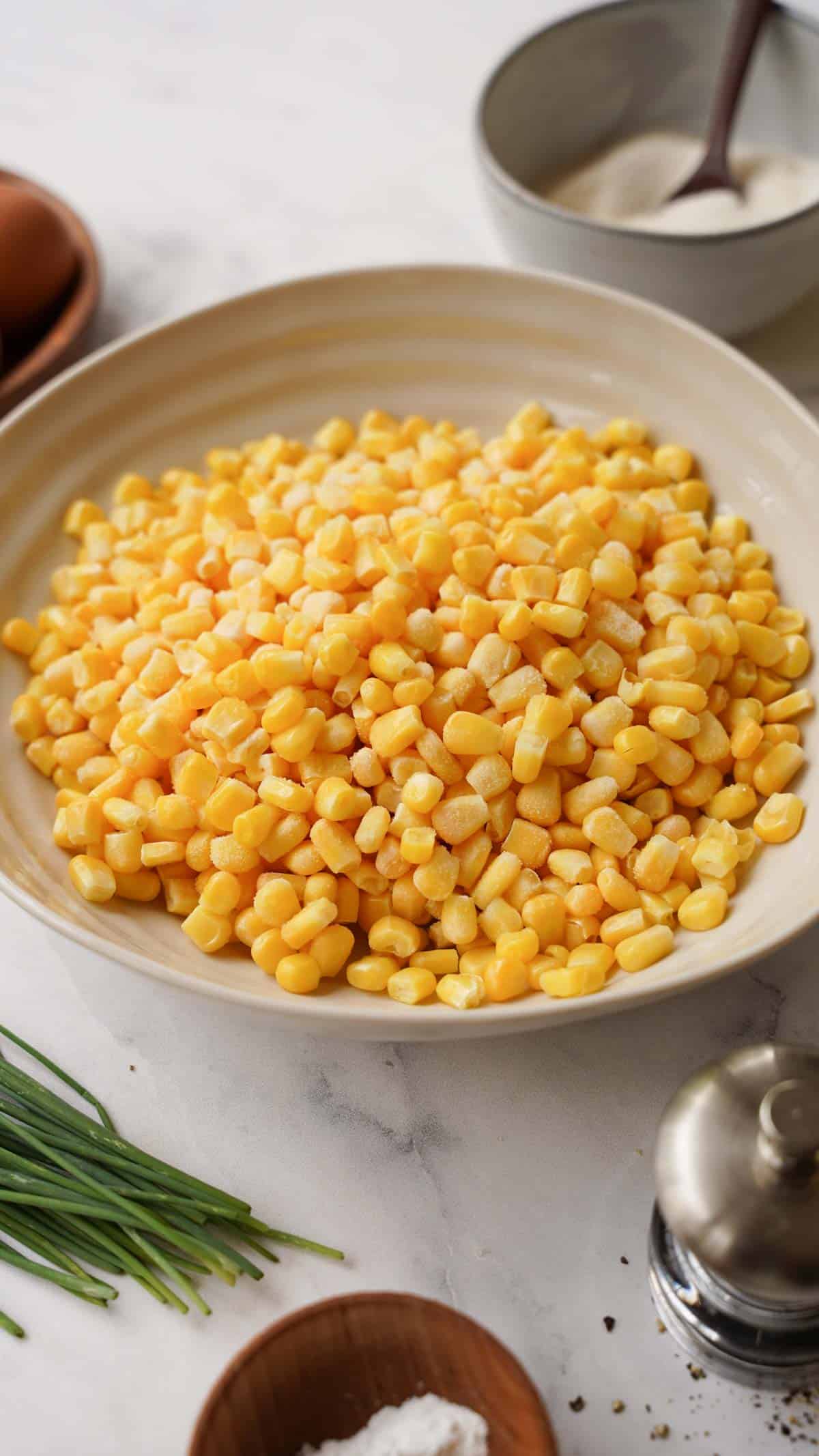 a bowl of whole corn kernels