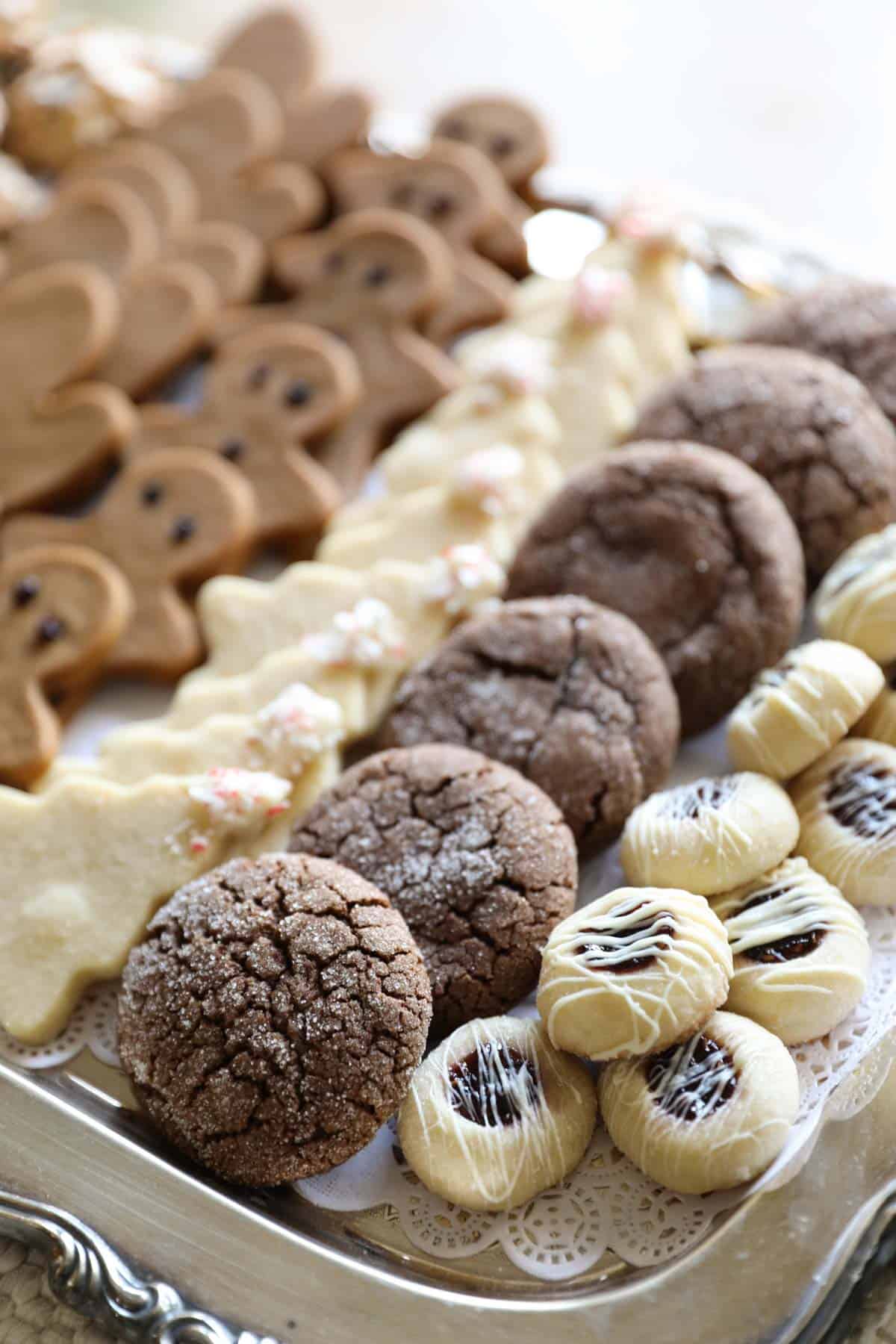 A tray iof different types of cookies for a cookie exchange