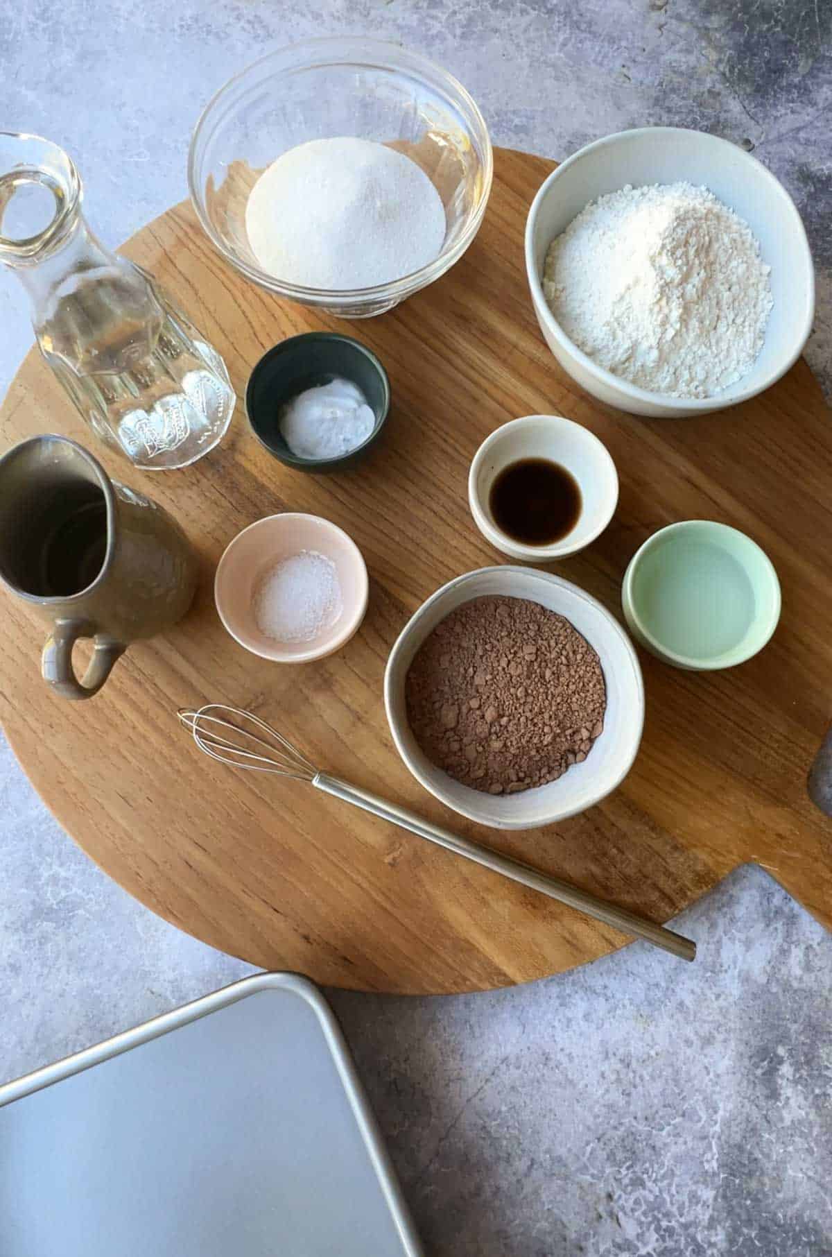 Ingredients laid out on a board for cake making