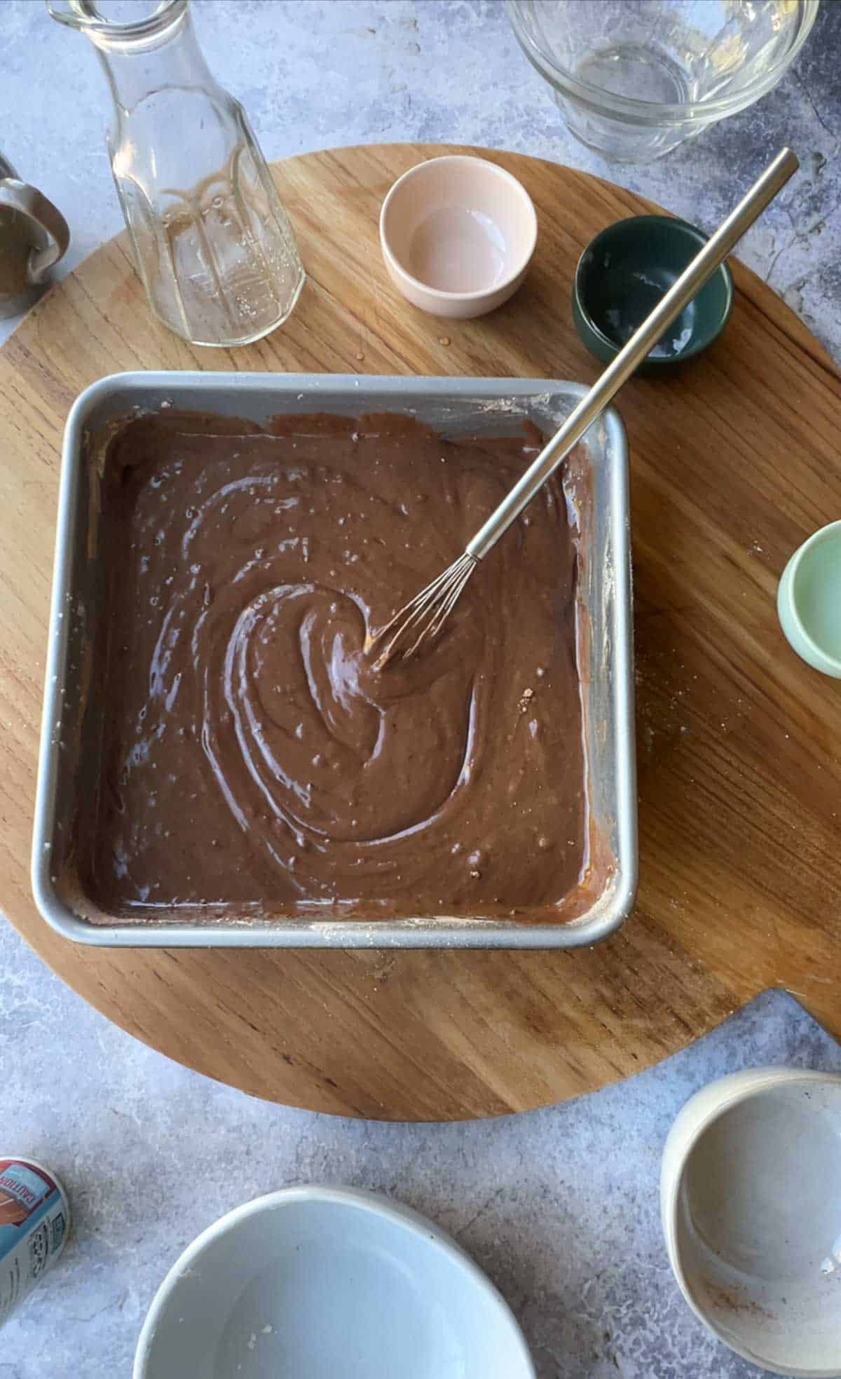 Mixed wet and dry ingredients in a cake pan