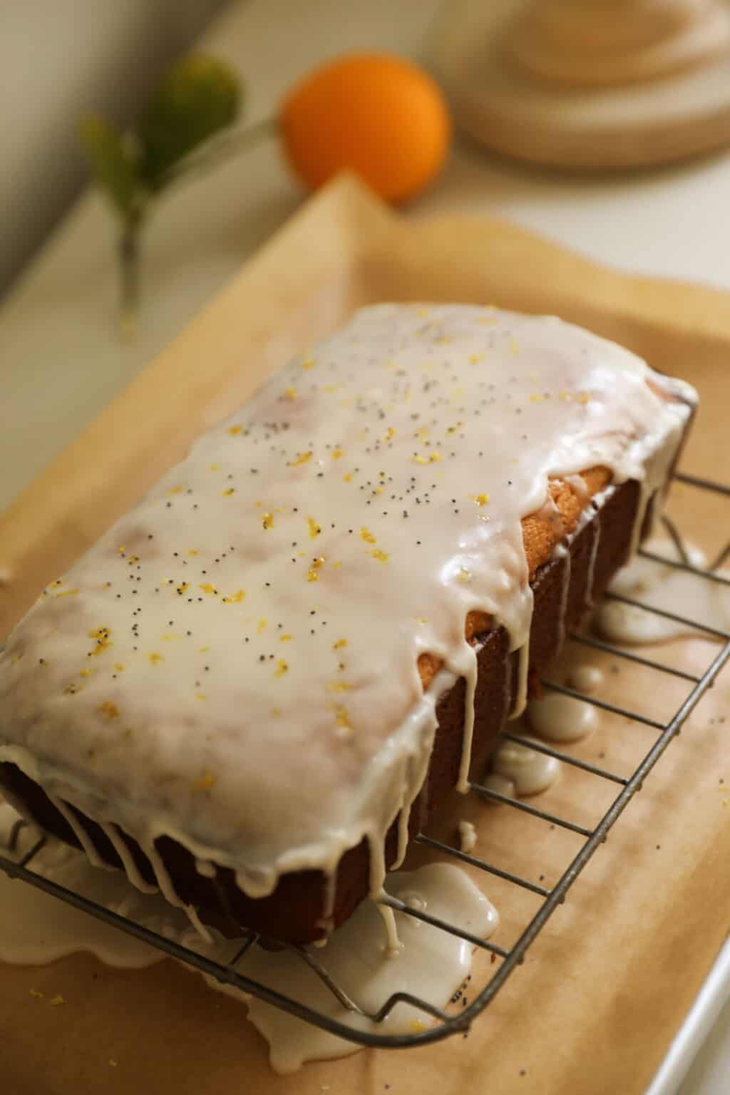 Lemon Poppy Seed Pound Cake Entertaining With Beth   LemonPoppySeedPoundCake LemonGlazeDrying 1024x1536 