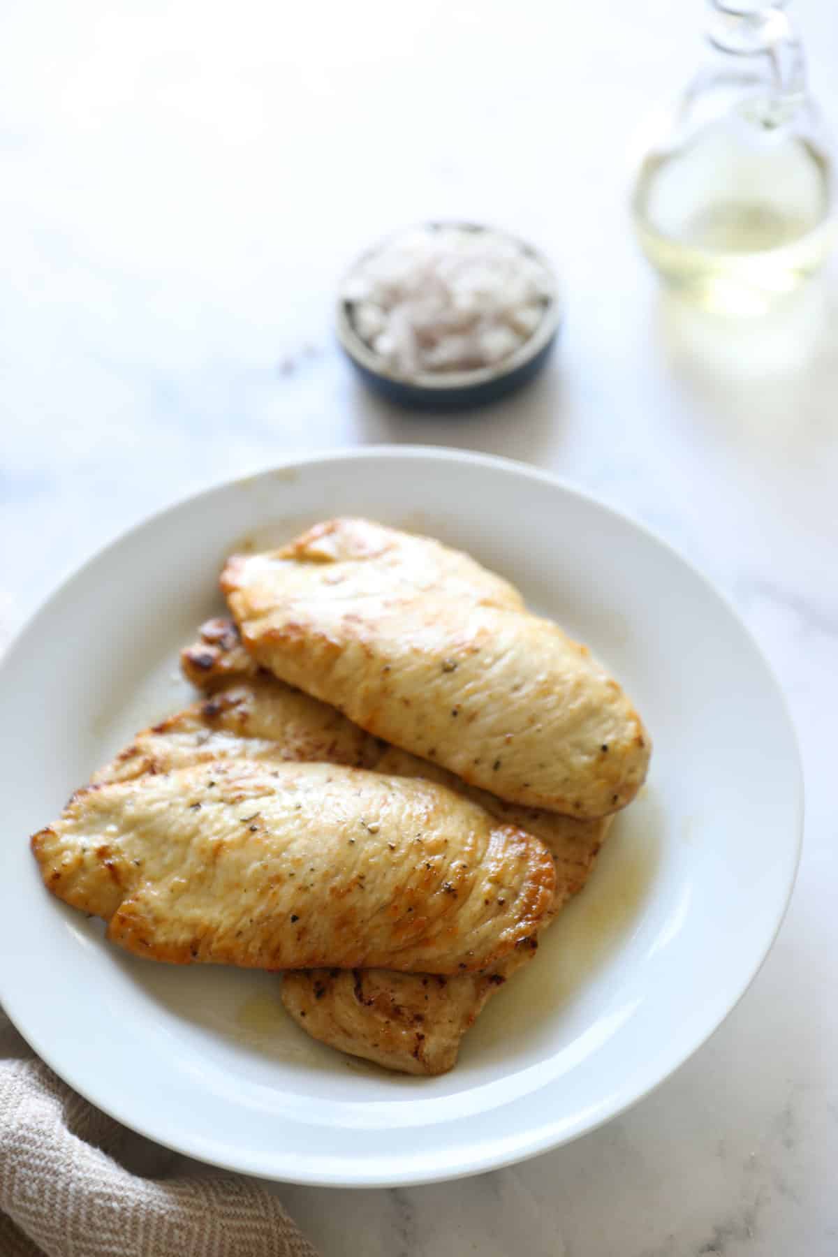 Seared Chicken Breasts on a white Plate