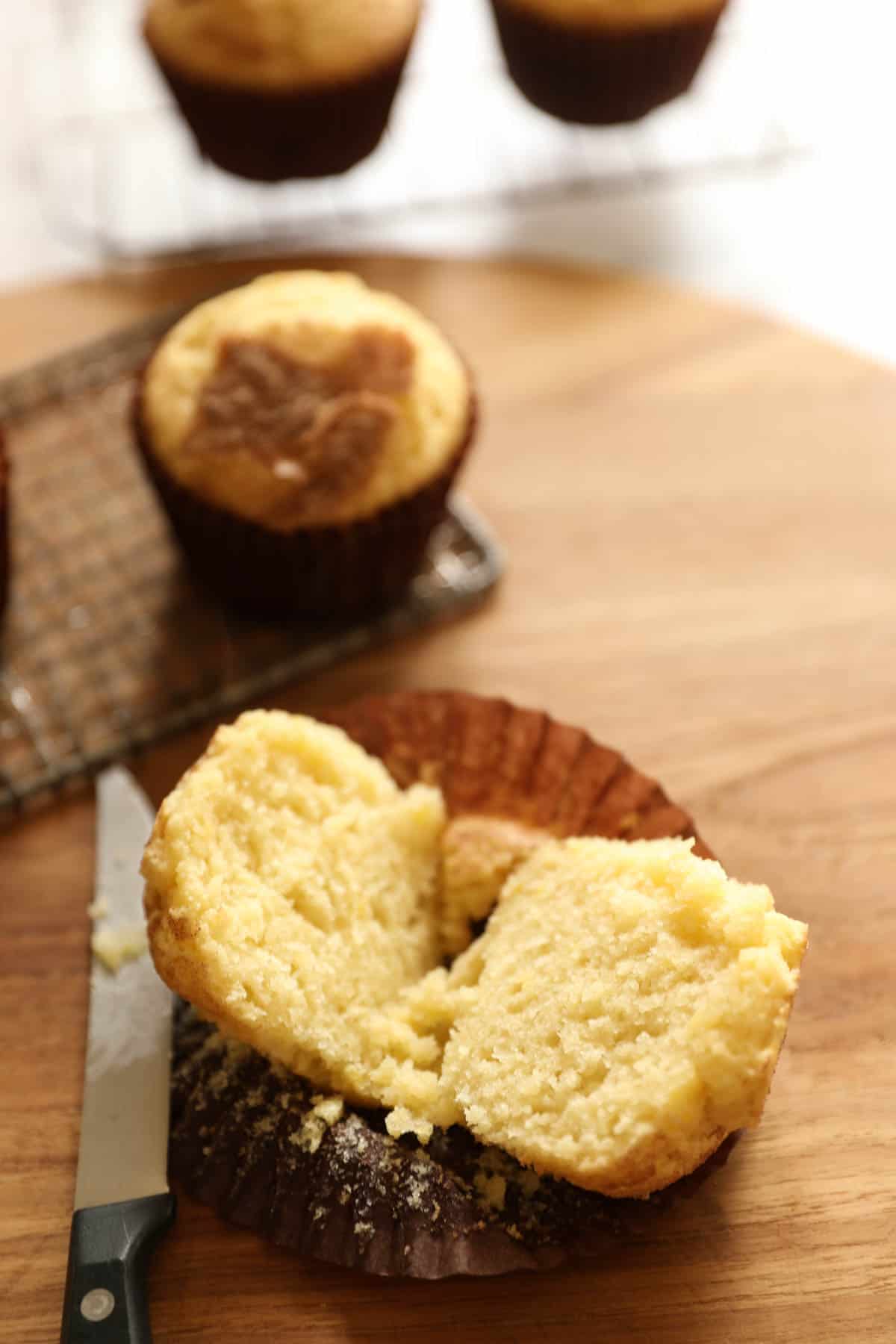 a muffin cut open showing the soft and moist texture