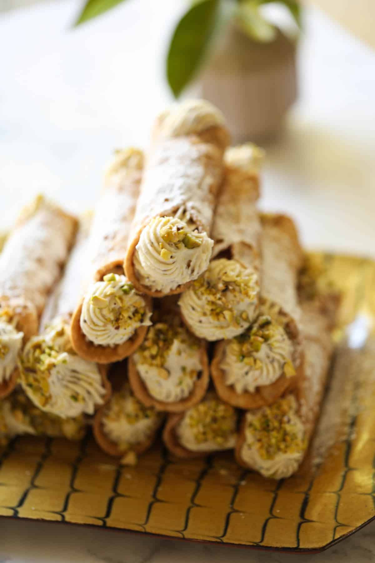 a stack of Italian Cannoli of a platter