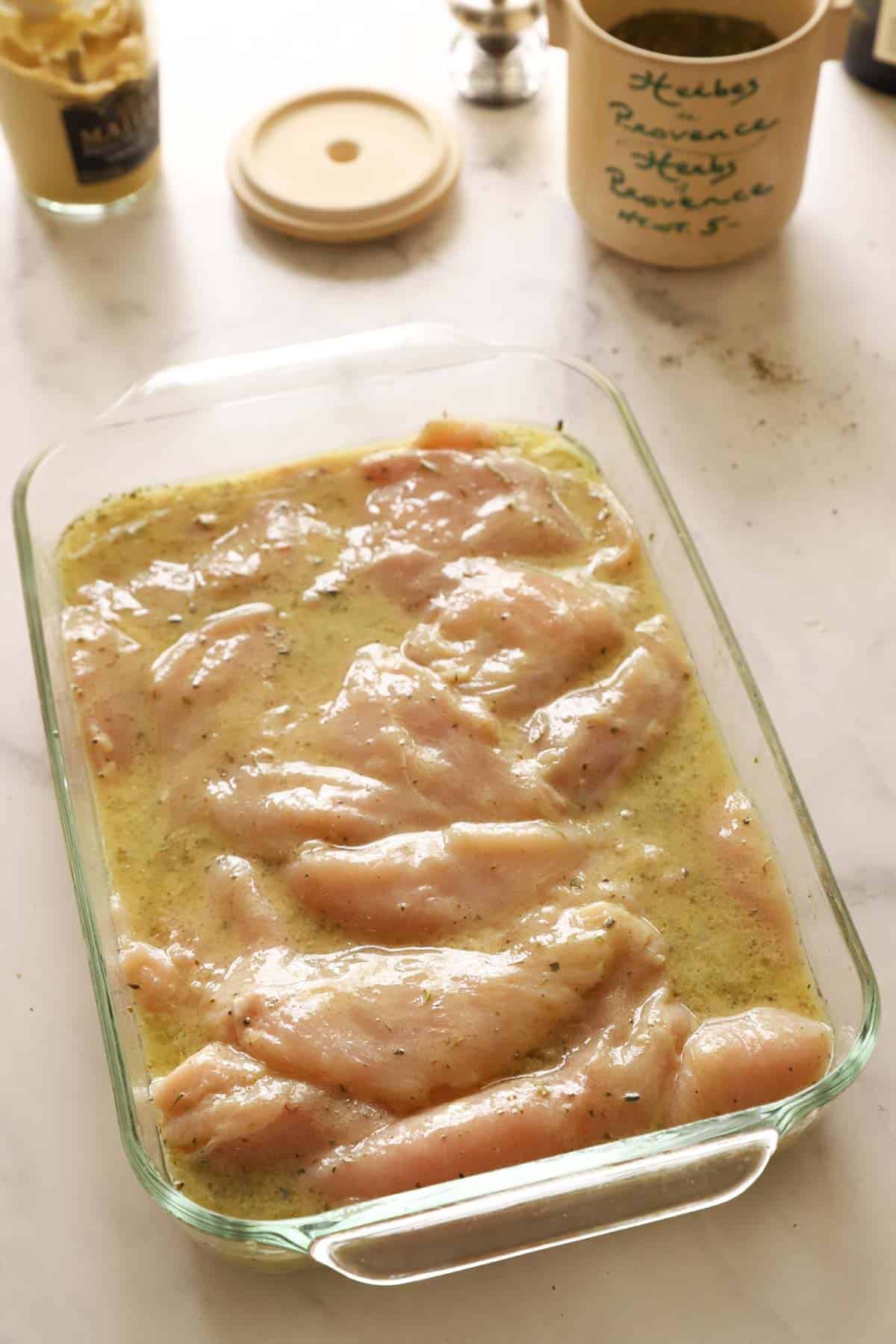 Chicken Marinating in a Pyrex Dish