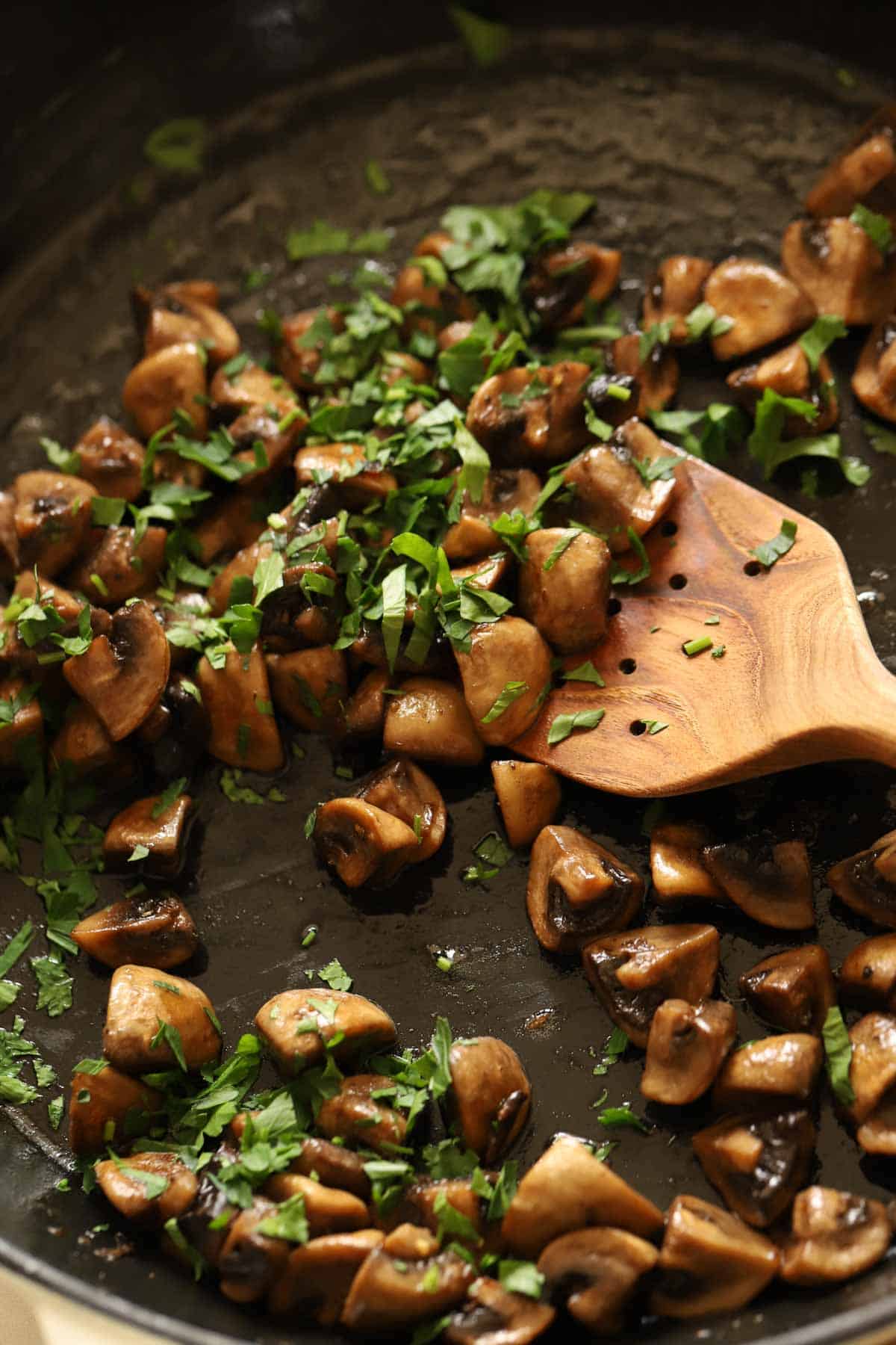 Sautéed mushrooms in garlic, butter, Worcestershire is complimented with fresh parsley.