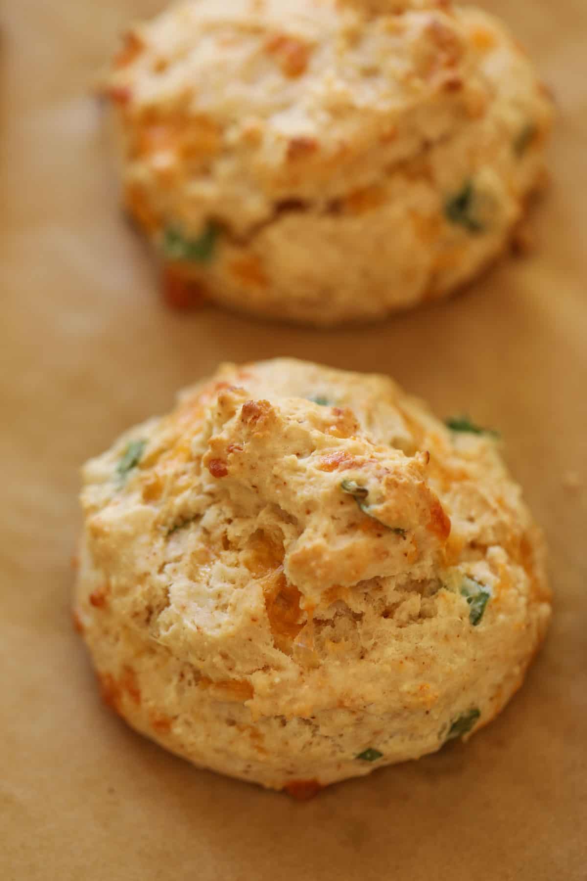 Cheddar Cheese Drop Biscuit on a baking sheet