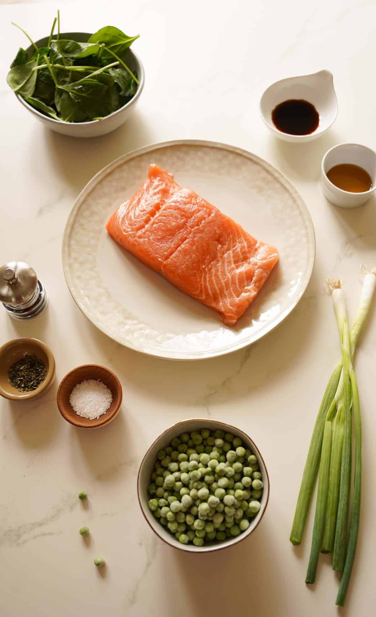Ingredients laid out on a counter for a salmon bowl