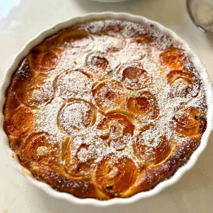 Baked clafoutis with apricots on top