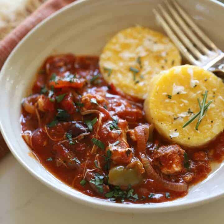 Chicken Cacciatore in a bowl with Polenta Cakes