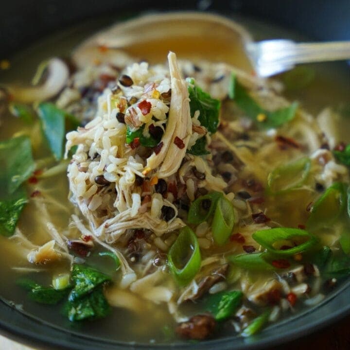 Chicken and Rice Soup in a Black Bowl