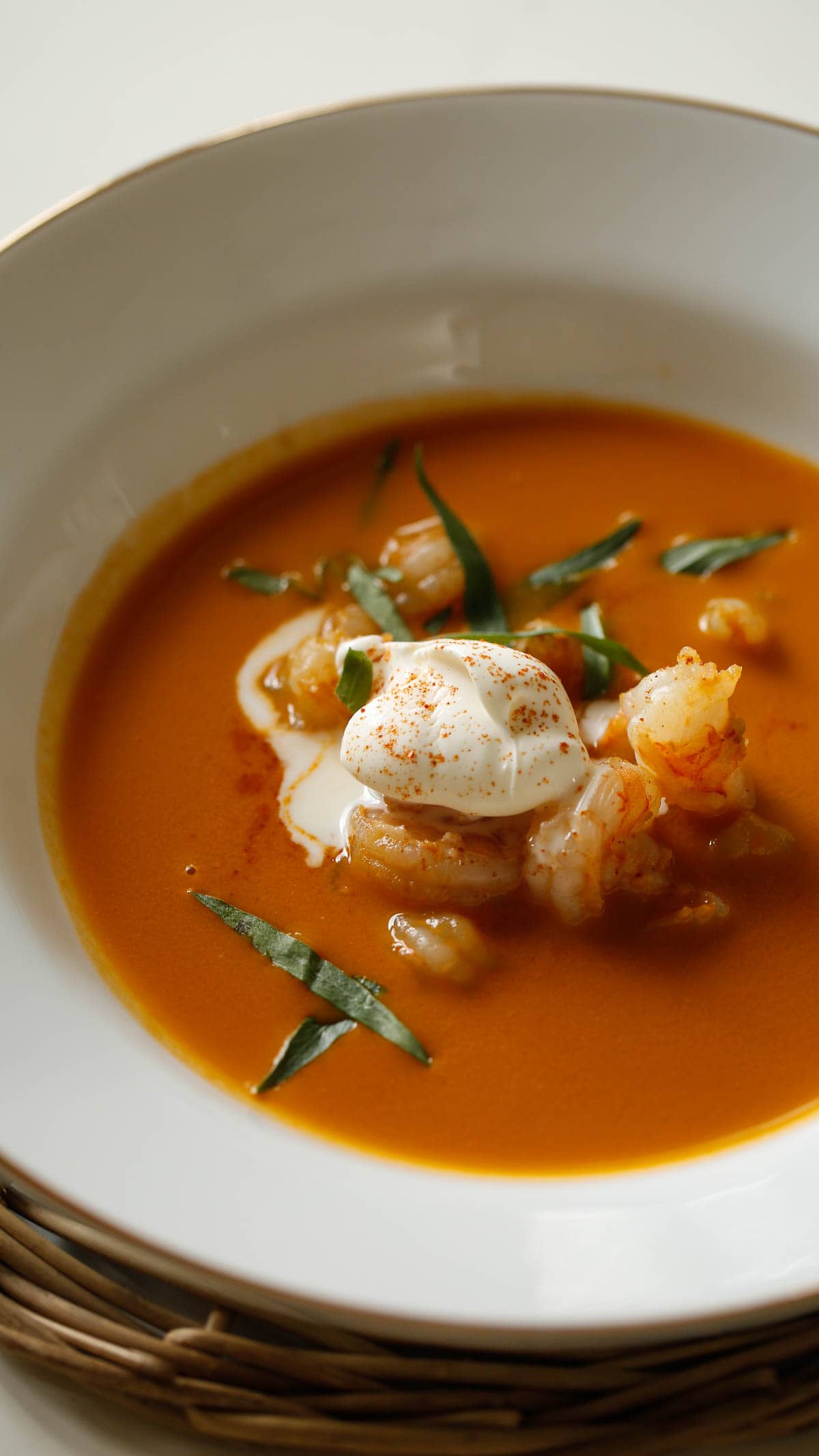 Shrimp bisque topped with creme fraiche