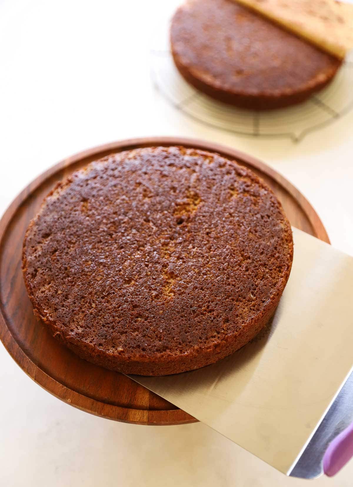 Cake layers being cooled and transfer to a cake stand