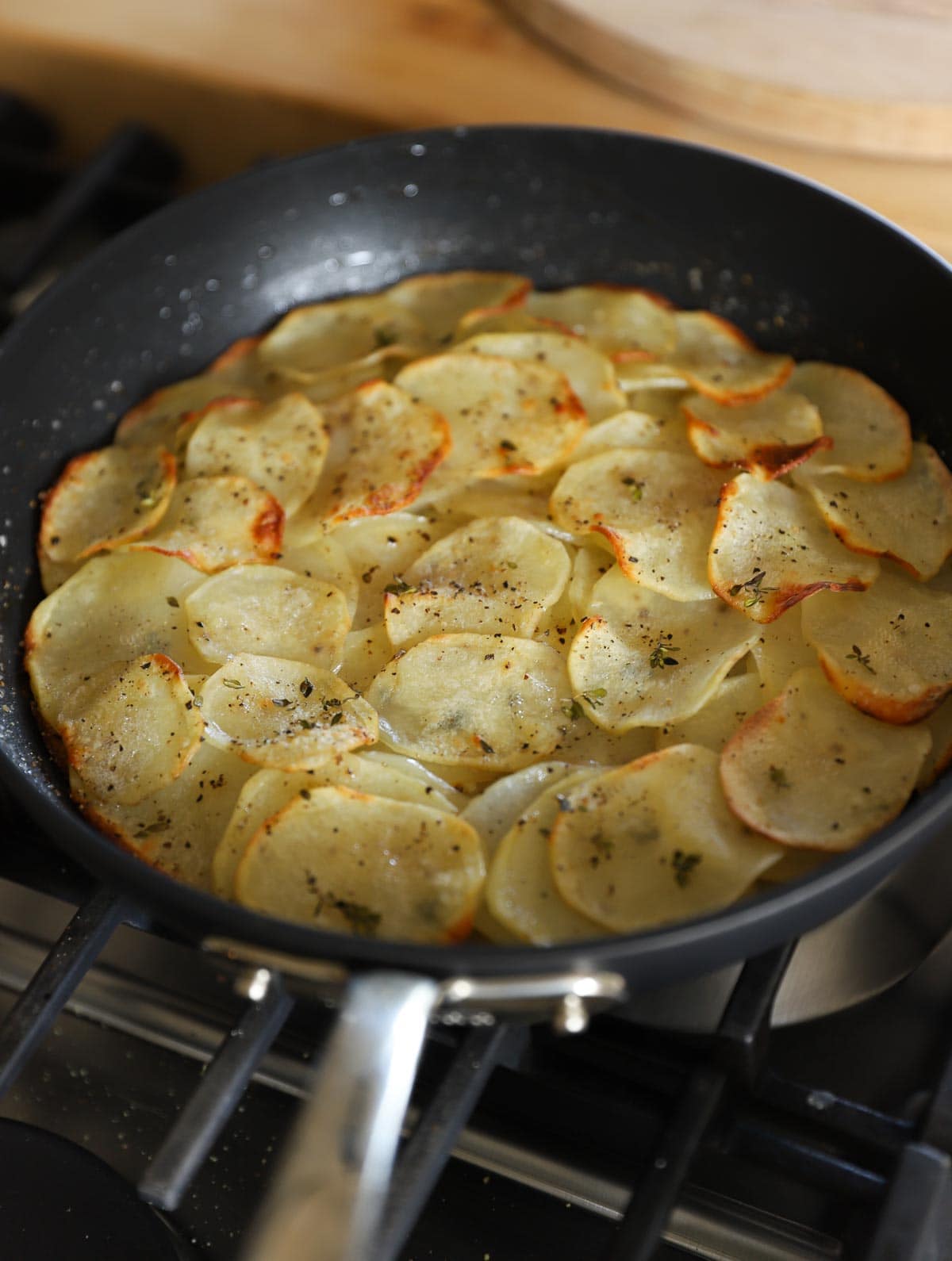 baked sliced potatoes in a non-stick skillet.