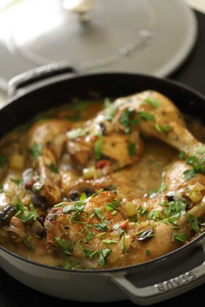 Chicken in a braising dish with lid