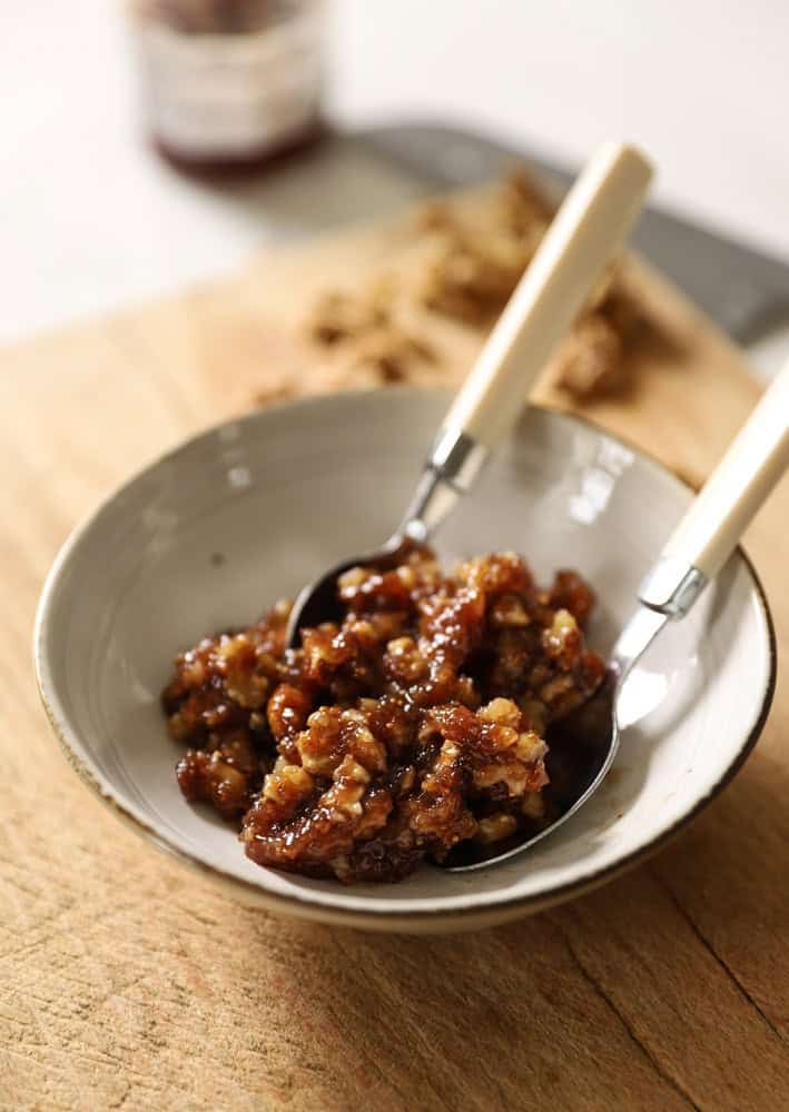 A fig cookie filling made with dried figs, fig jam and walnuts in a bowl
