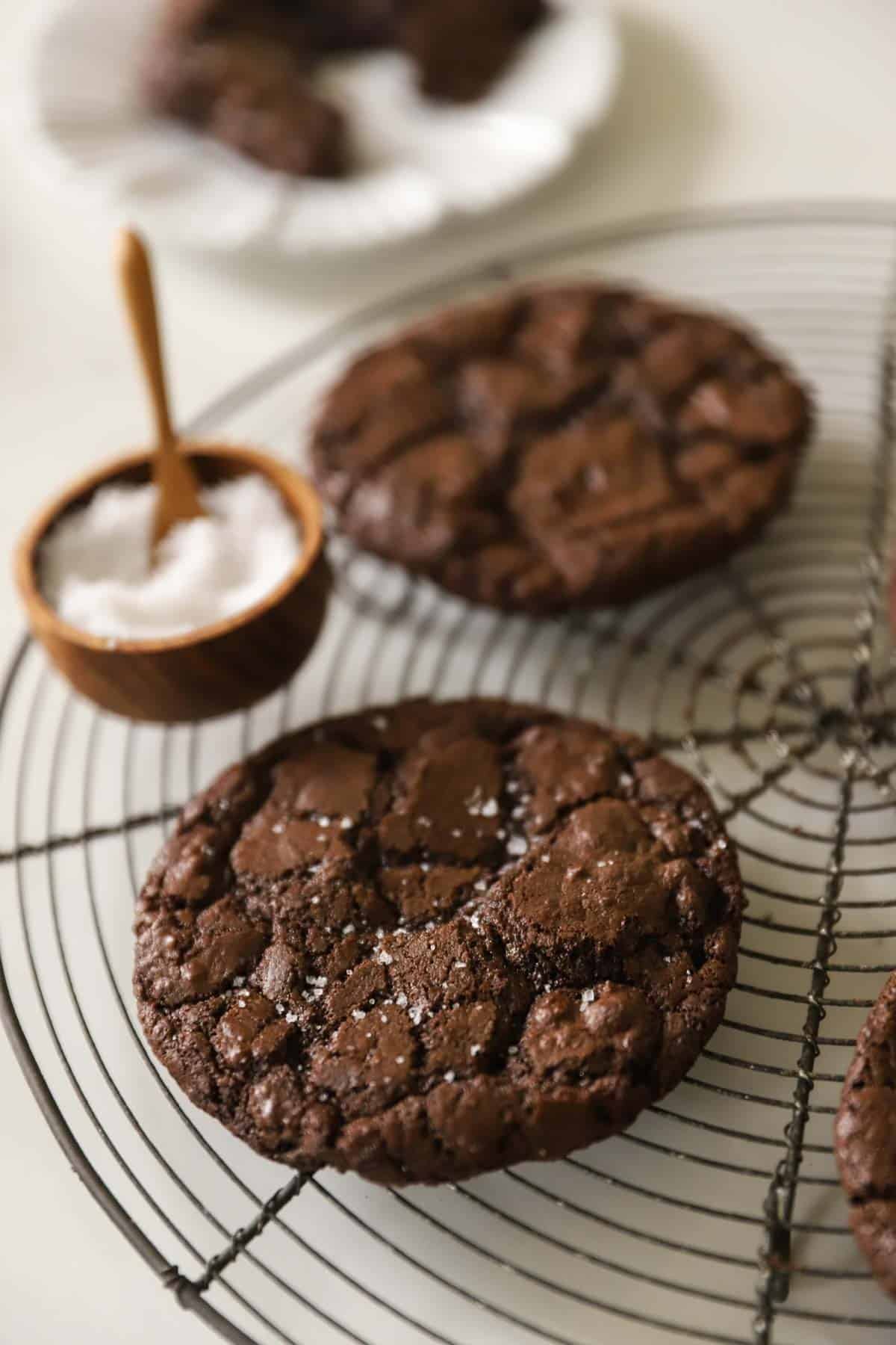Chocolate cookies with sea salt sprinkled on them.