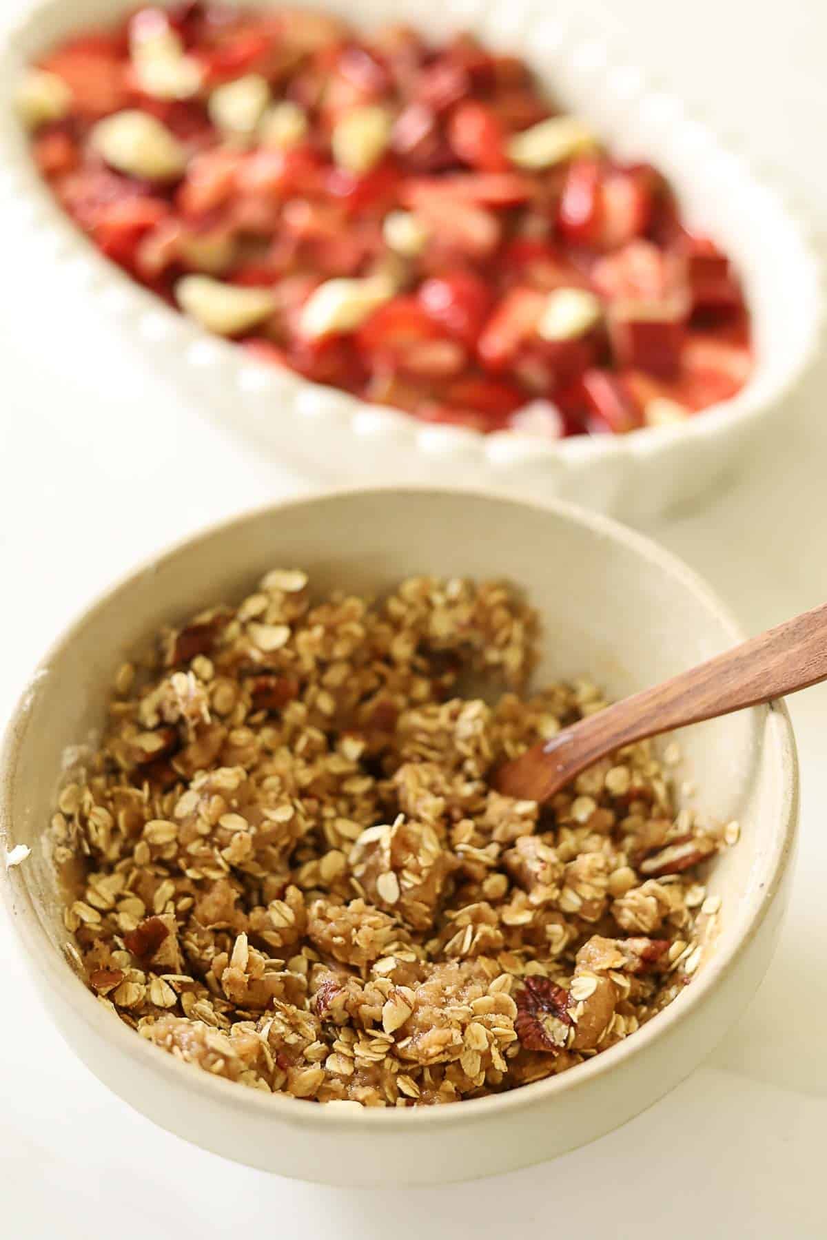 crisp topping mixed in a small bowl with oatmeal.